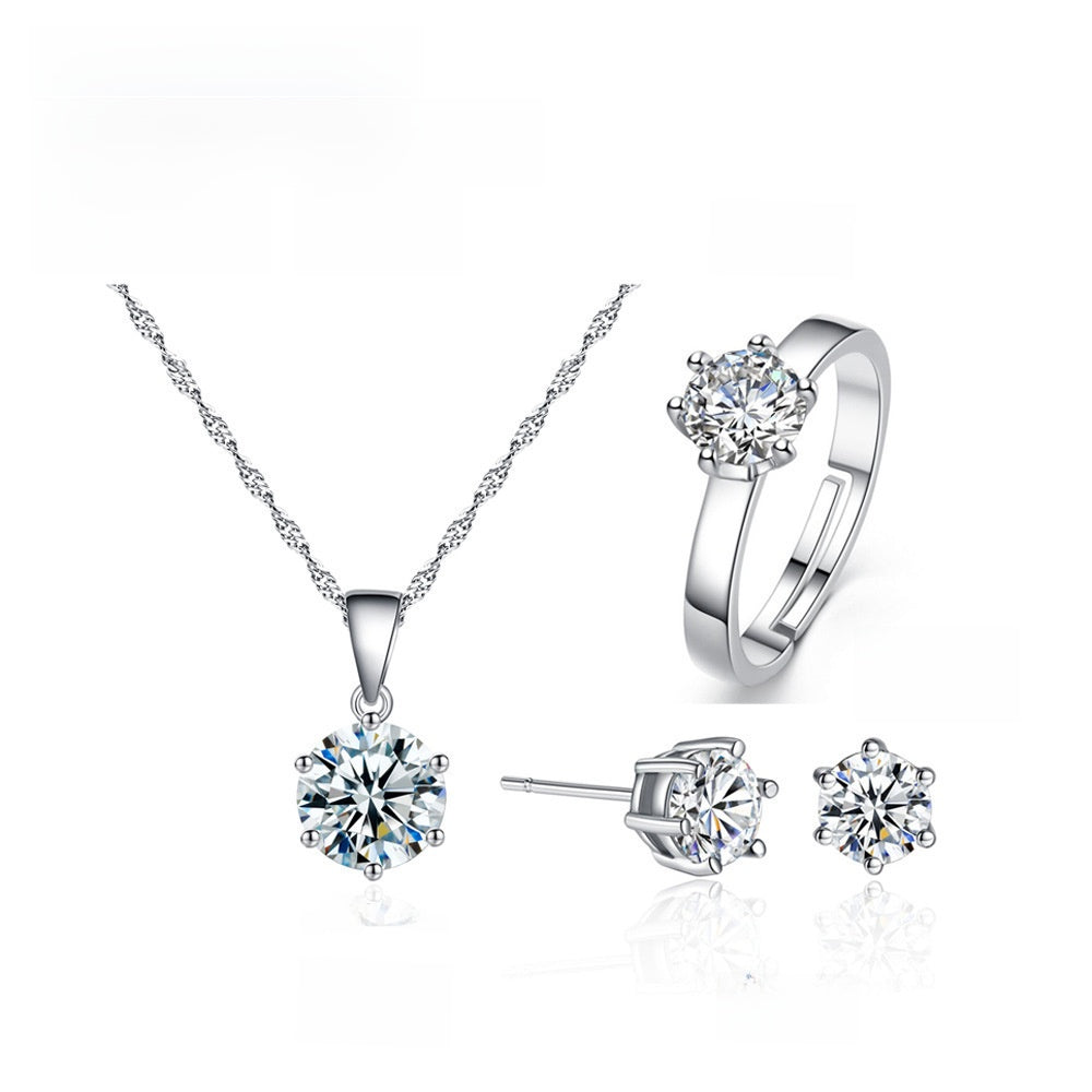 Six-prong ring, necklace, and earrings