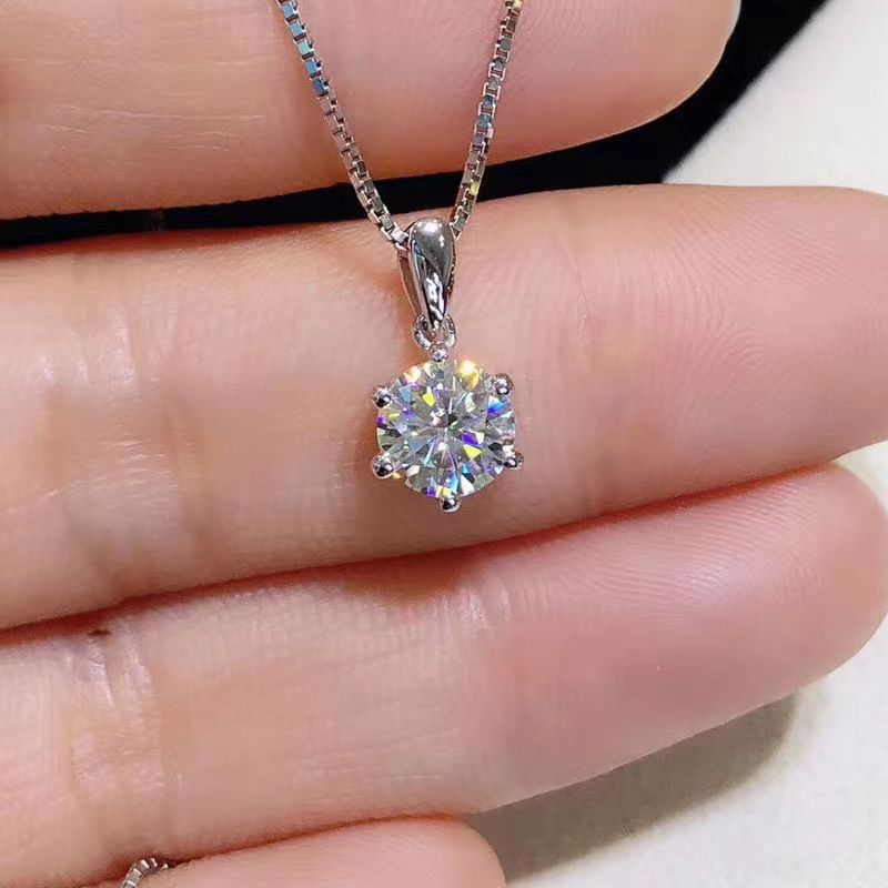 Six-prong ring, necklace, and earrings
